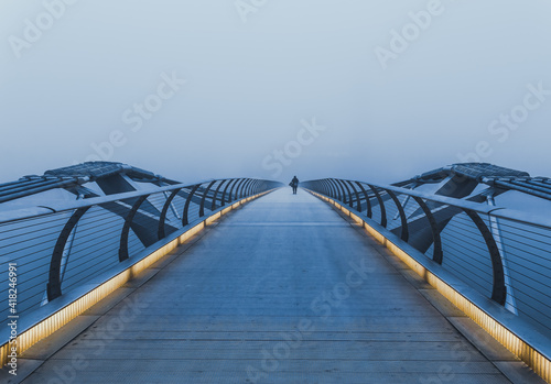 London's Millennium Bridge on a foggy morning