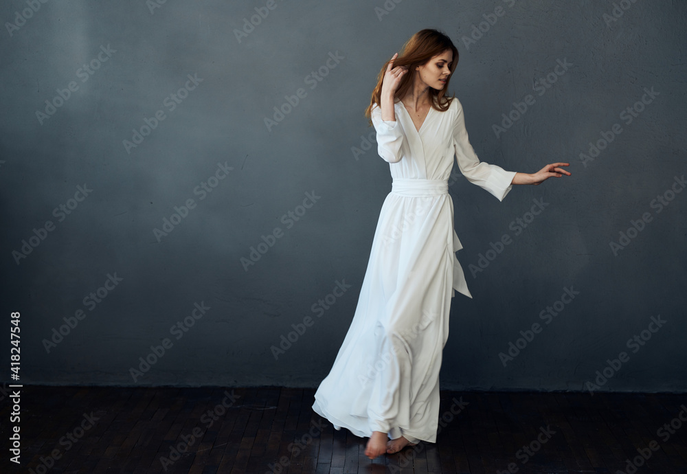 attractive woman in white dress glamor gray background attractive woman in white dress glamor gray background