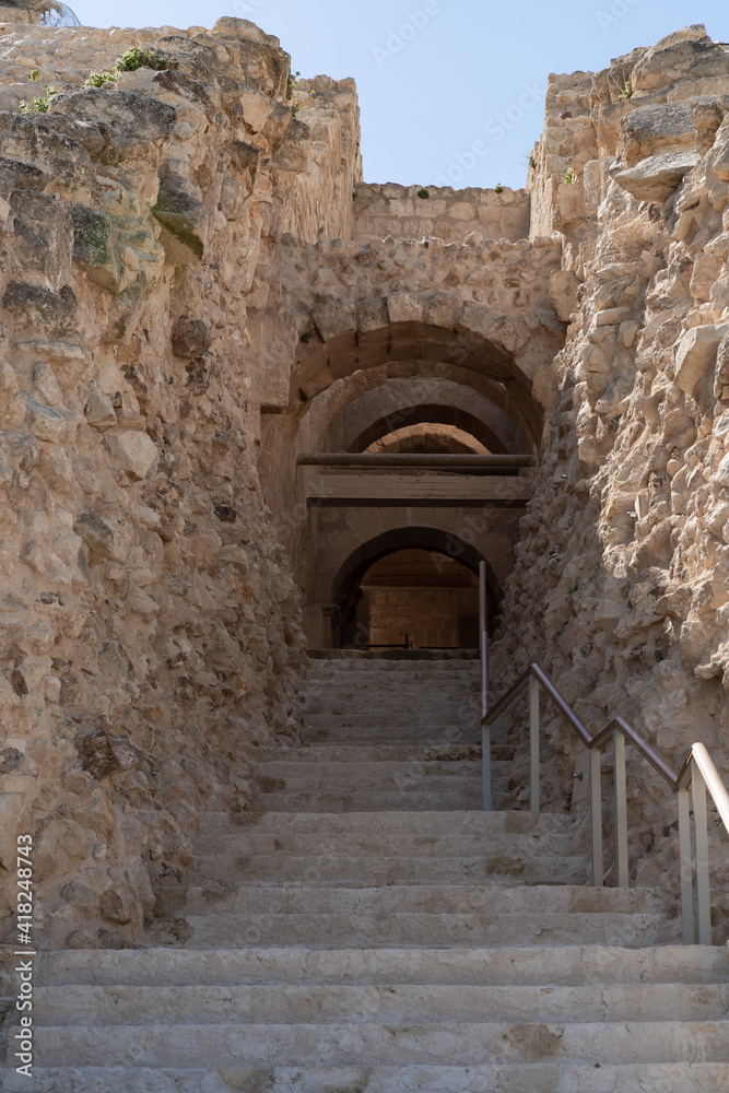 Partially  restored entrance to the ruins of the palace of King Herod - Herodion in the Judean Desert, in Israel