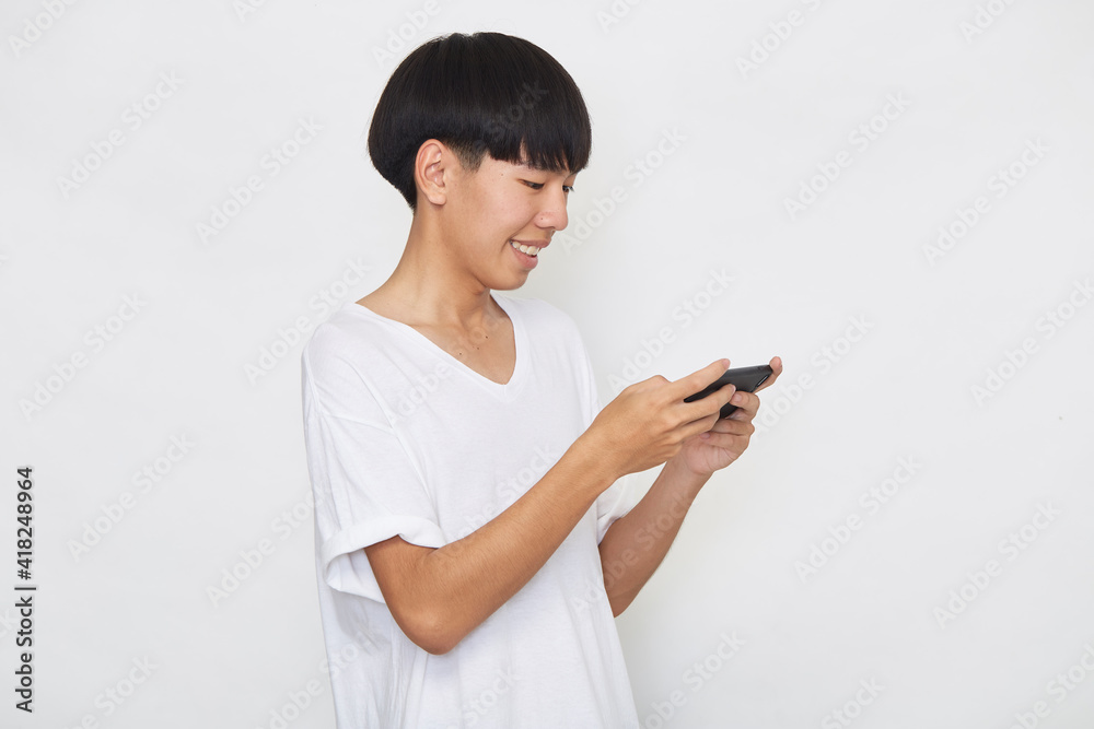 Young Asian man with a mobile phone Young Asian man with a mobile phone