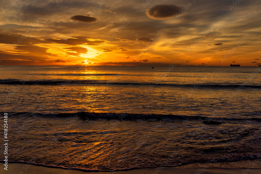 A beautiful sunrise from the shore of the beach