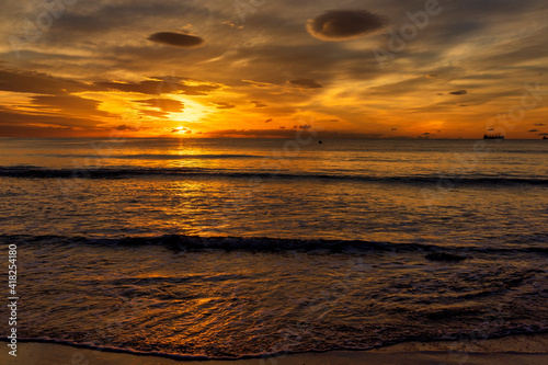 A beautiful sunrise from the shore of the beach