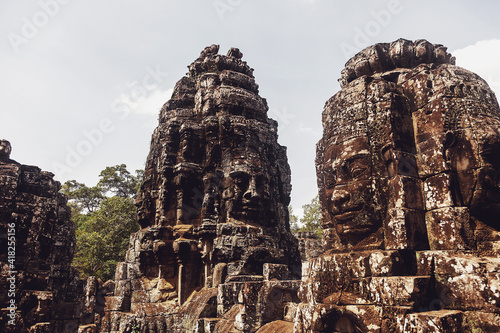 Stone ruins of Angkor Wat temple complex largest religious monument and UNESCO World Heritage Site. Ancient Khmer architecture with stone murals and sculptures. Amazing travel to Siem Reap  Cambodia