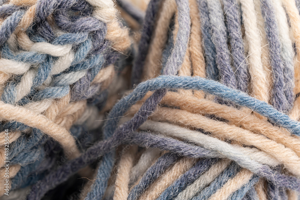 Photo of colored balls from knitting yarn. Knitting supplies close-up. Knitting-women's needlework.