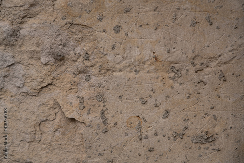 Textured background in the form of a brown old wall