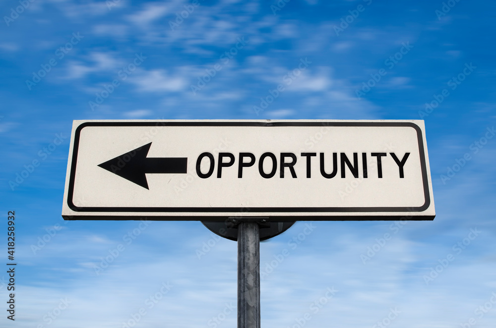Opportunity road sign, arrow on blue sky background. One way blank road sign with copy space. Arrow on a pole pointing in one direction. Opportunity road sign, arrow on blue sky background. One way blank road sign with copy space. Arrow on a pole pointing in one direction.
