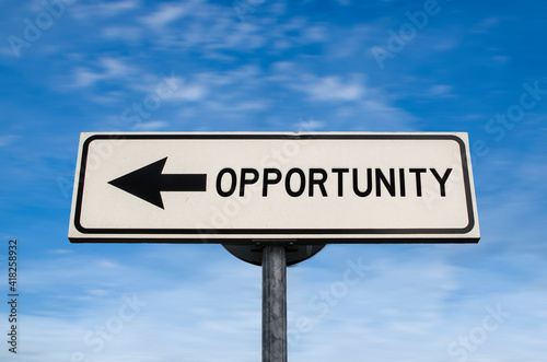 Opportunity road sign, arrow on blue sky background. One way blank road sign with copy space. Arrow on a pole pointing in one direction.