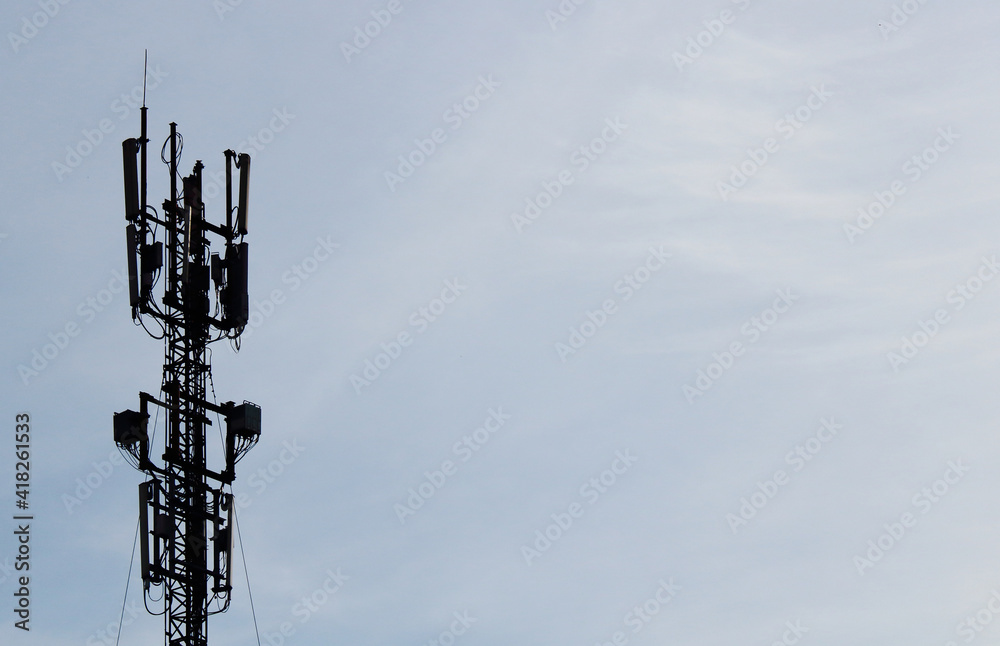 Mobile antenna against the background of the morning sky Mobile antenna against the background of the morning sky