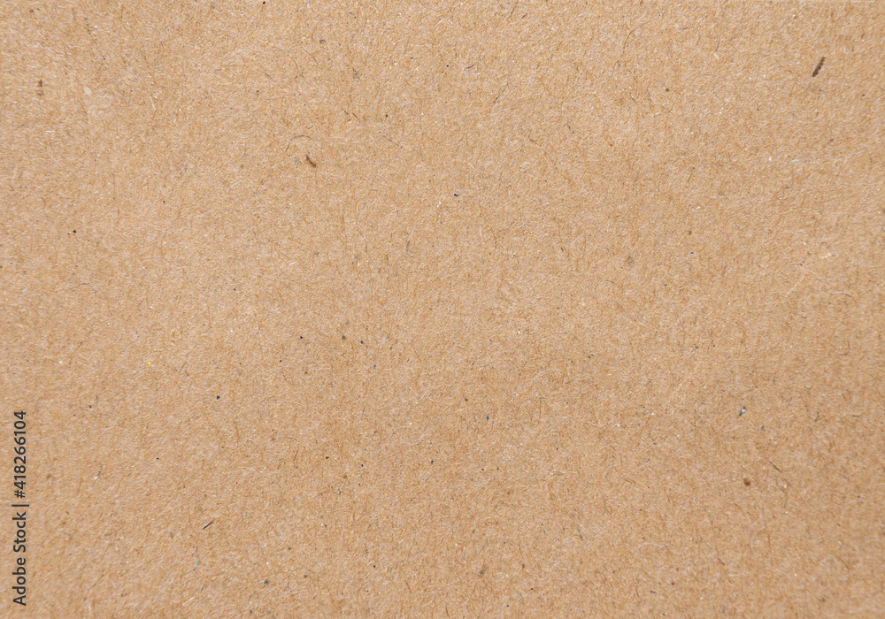 Brown paper texture background of paperboard sheet.