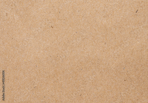 Brown paper texture background of paperboard sheet.