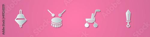 Set paper cut Whirligig toy, Drum with drum sticks, Baby stroller and Sword icon. Paper art style. Vector.