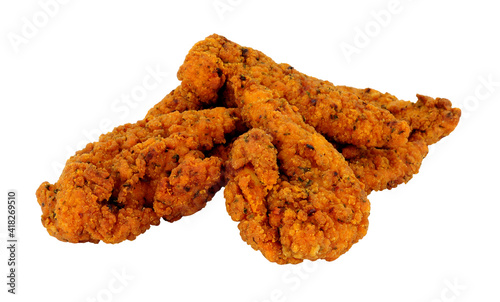 Photos Fried spicy breadcrumb covered chicken fillets isolated on a white background