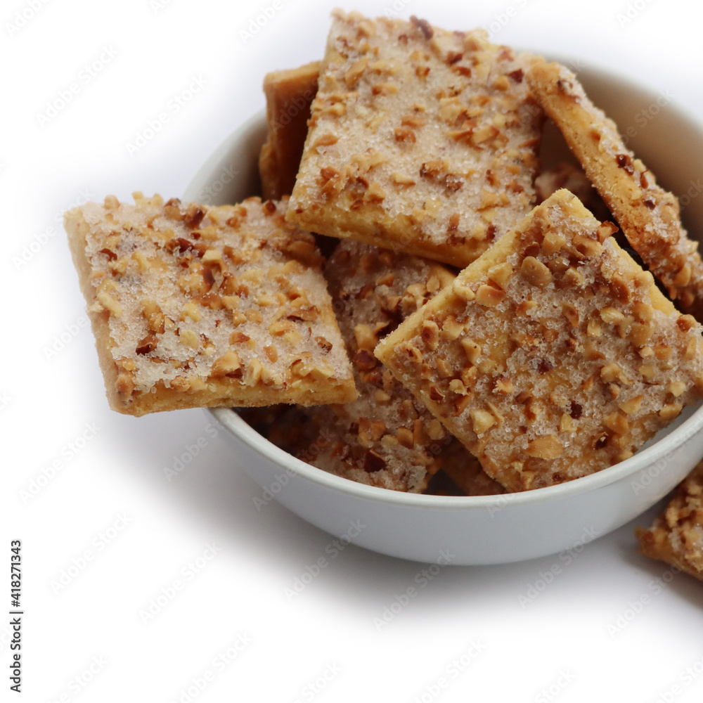 Traditional italian cookies with hazelnut and sugar glaze isolated on white background Traditional italian cookies with hazelnut and sugar glaze isolated on white background
