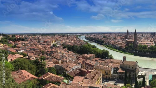 Verona, Italy. View on the riverside with historical buildings and towers.