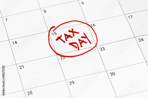 Vászonkép Tax day marked on April 15 calendar with red marker