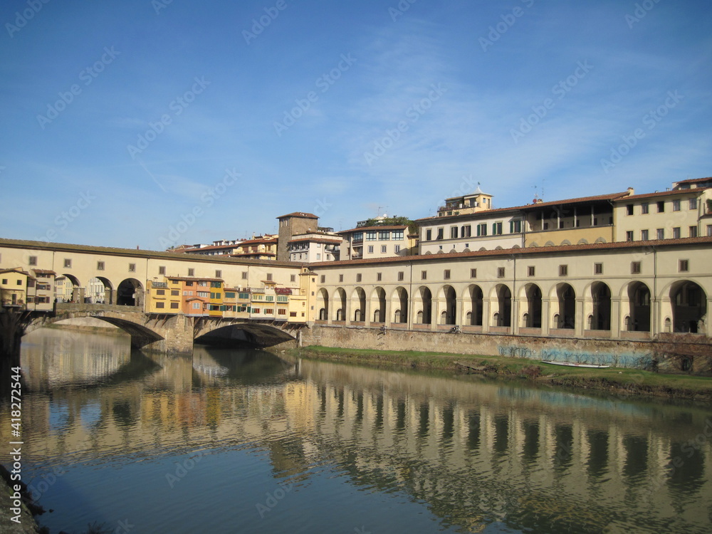View of the River Arno in the morning. Scenic landscape with Ponte Vecchio. Travel to European Union. UNESCO World Heritage Site.