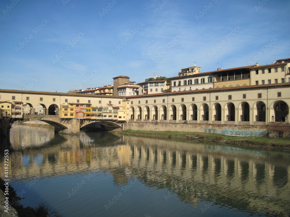 View of the River Arno in the morning. Scenic landscape with Ponte Vecchio. Travel to European Union. UNESCO World Heritage Site.