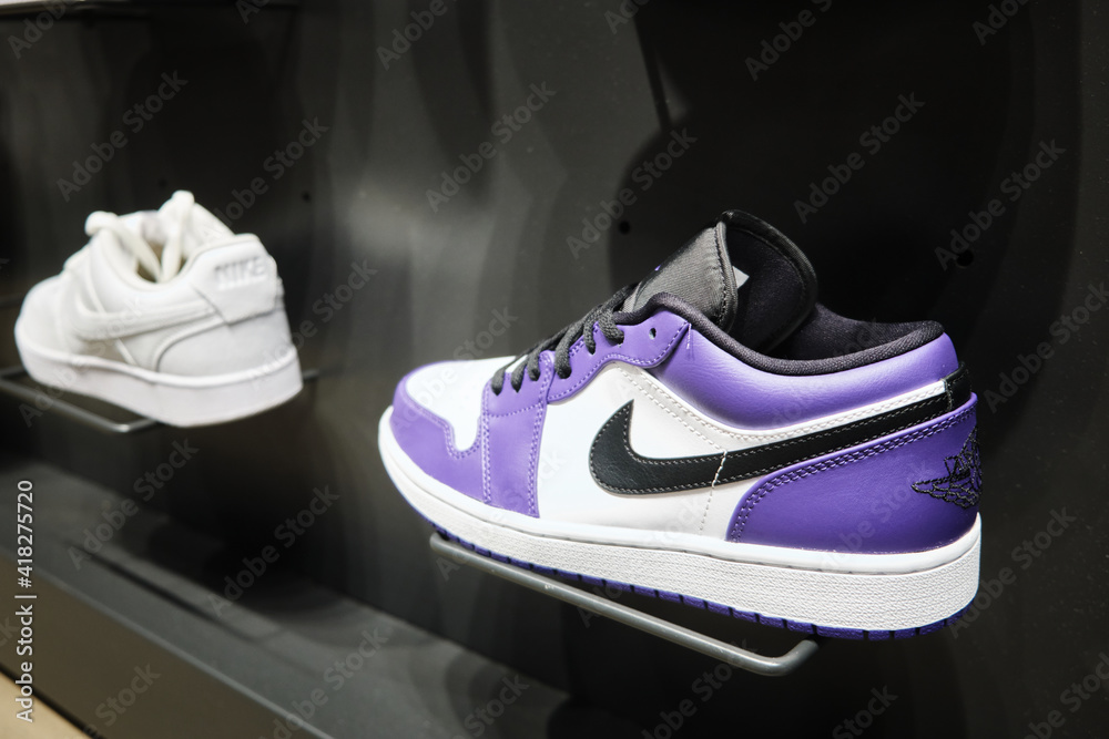 Nike Air Jordan 1 Low Court Purple colorway sneakers at retail store  display. Mersin, Turkey - November 2020 Stock Photo | Adobe Stock