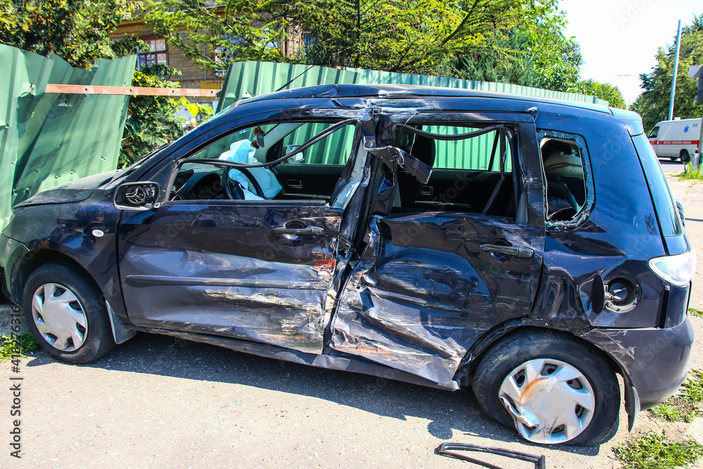 Car accident in the street. Smashed auto after car collision Car accident in the street. Smashed auto after car collision