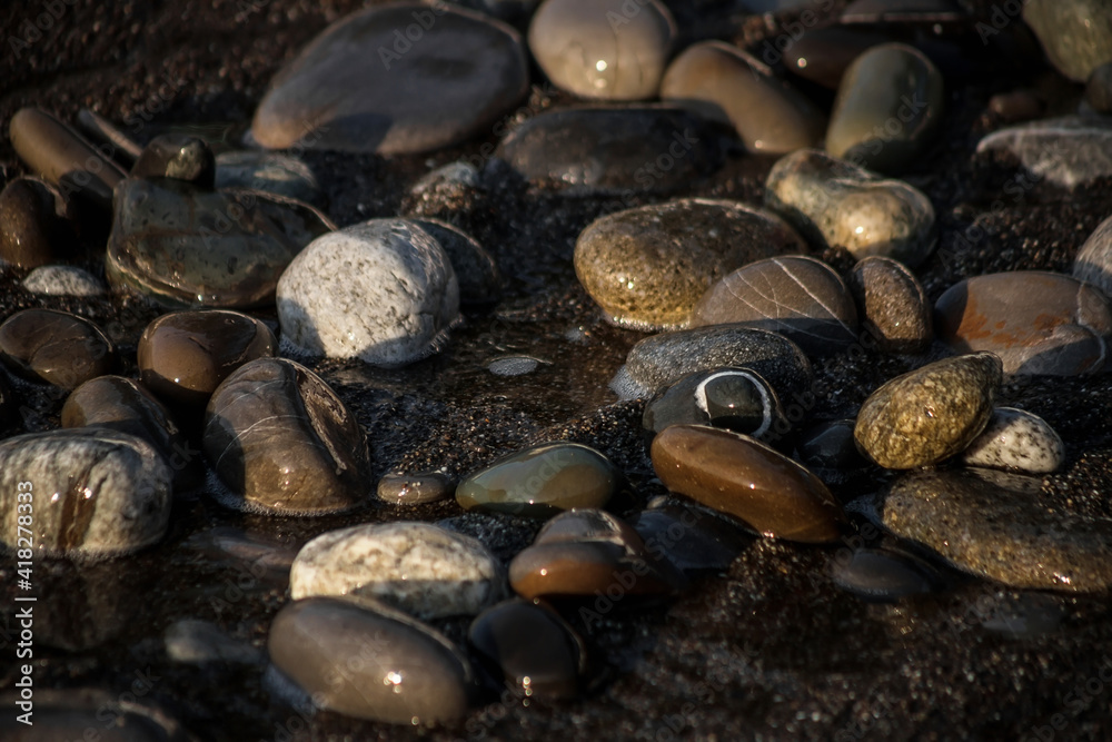 Sea shore with stones and foam, pebble seascape. Sea shore with stones and foam, pebble seascape.