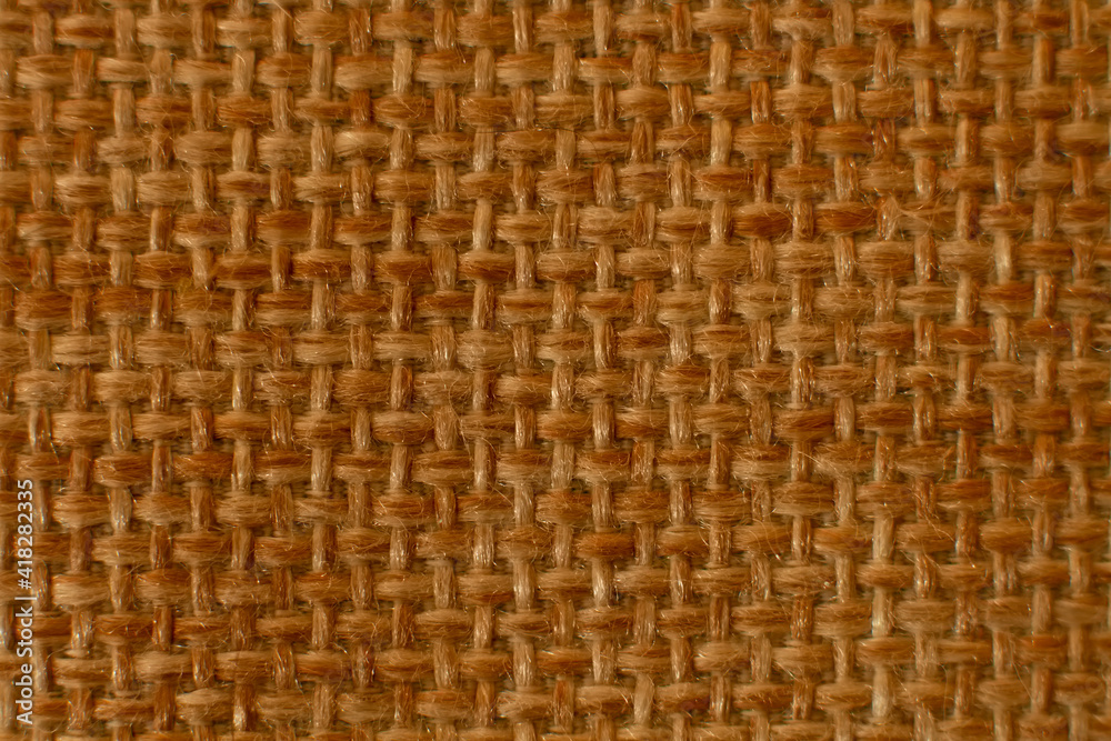 straw tied background. Straw hat knitted material closeup straw tied background. Straw hat knitted material closeup