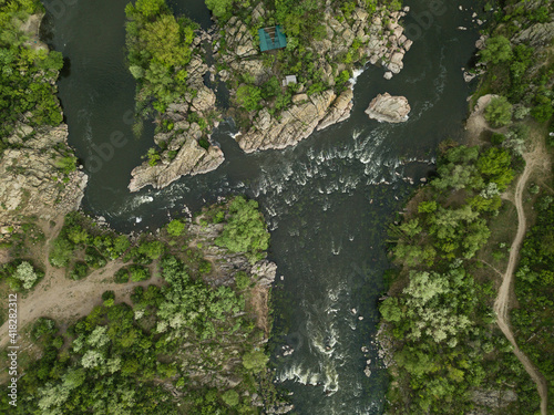 Aerial rocky landscape on Southern Bug River with rapids. Ukraine