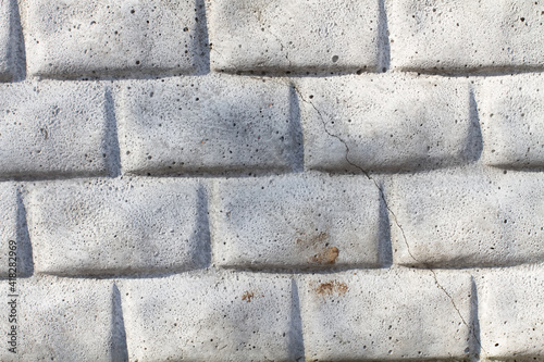 white wall of blocks of stones