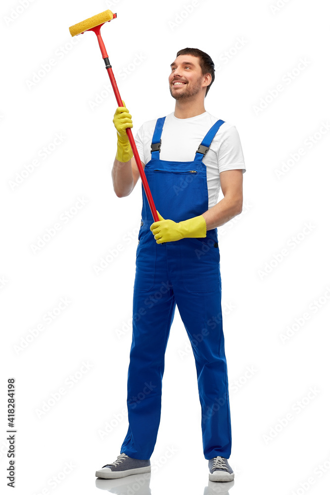 profession, service and people concept - happy smiling male worker or cleaner in overall and gloves with window cleaning mop over white background profession, service and people concept - happy smiling male worker or cleaner in overall and gloves with window cleaning mop over white background
