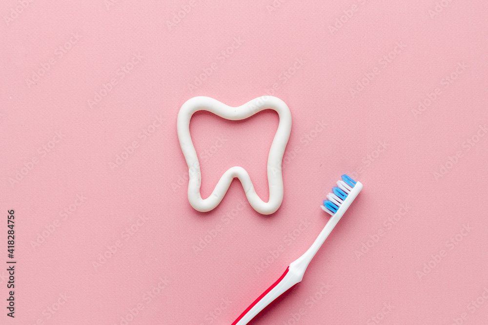 Flat lay of toothbrush with toothpaste, oral care products Flat lay of toothbrush with toothpaste, oral care products