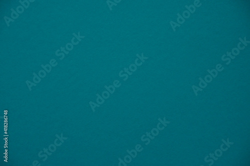 Paper, cardboard background. High resolution paper texture. Colored Blue background.