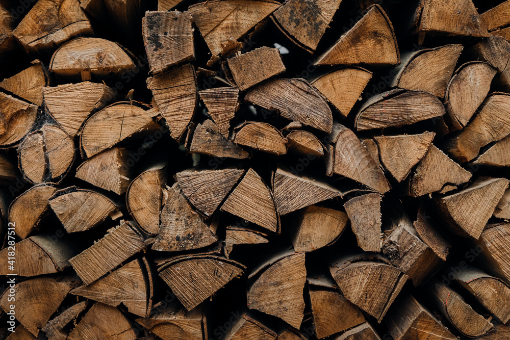 Cut and stacked tree trunks. Wood for fireplace Cut and stacked tree trunks. Wood for fireplace
