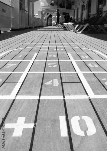 Black and White image shuffleboard on ship deck cruising game