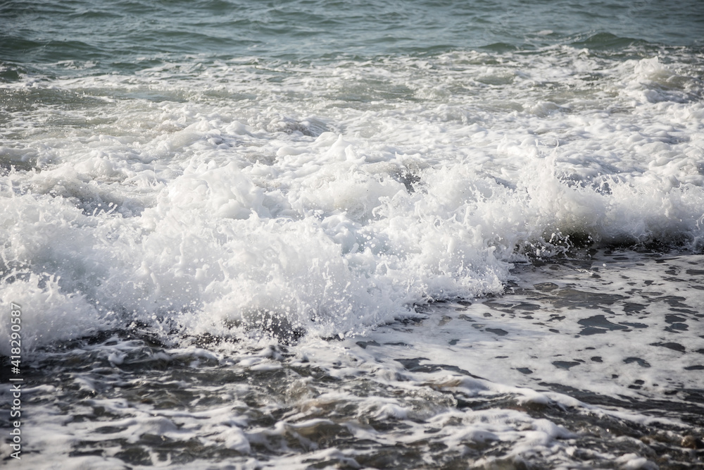 Fototapeta premium Sea wave close-up. Sea foam.