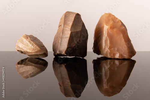 Flint cores from the stone age. From the Paleolithic period and Acheulean culture. Sahara desert. photo