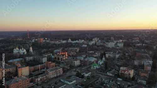 Europe, Poltava, Ukraine - March 2021: Aerial view of the city. Sights of the city from above. Beautiful sunset. photo