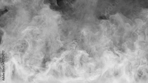 Dynamic fog on a dark background. Realistic atmospheric White smoke slowly rises upward. Smoke stream effect 4K