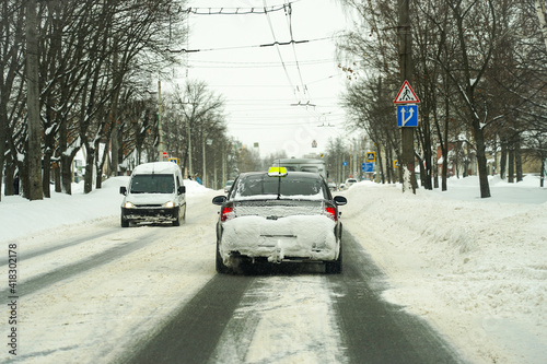 The car was covered with snow.