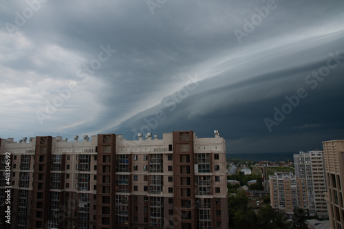 stormy sky is approaching the city © Надежда Долгова
