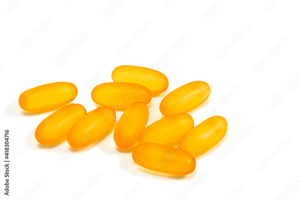 Close up of capsules Omega 3 on white background. Copy space for your text. Top view, high resolution product. Health care concept Close up of capsules Omega 3 on white background. Copy space for your text. Top view, high resolution product. Health care concept