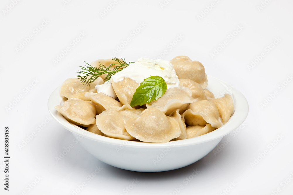 Cooked dumplins Ravioli and paprika