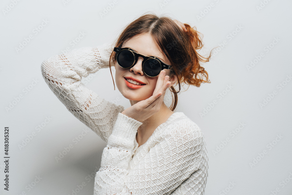 red-haired woman wearing glasses white sweater cropped view red-haired woman wearing glasses white sweater cropped view