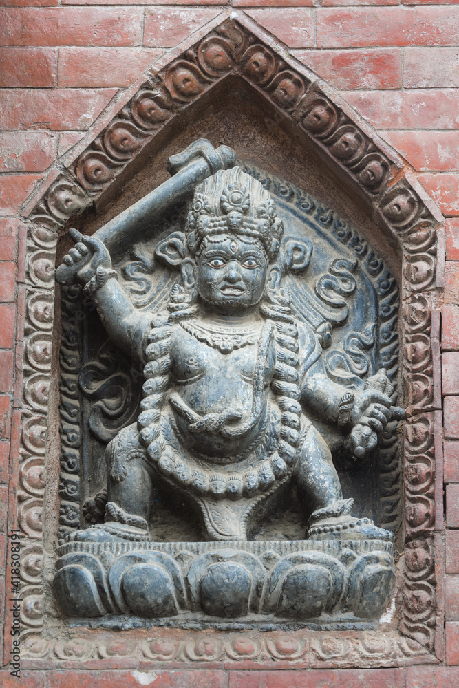 Deity statue, Swayambunath or Monkey Temple, Unesco World Heritage Site, Kathmandu, Nepal, Asia
