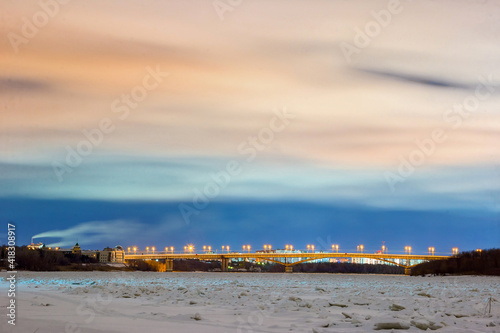 sunset over the river in winter in Omsk