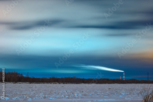 sunset over the river in winter in Omsk