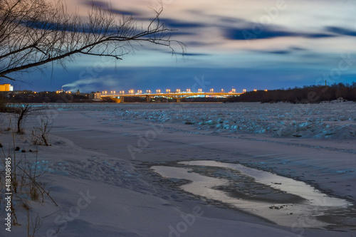 sunset over the river in winter in Omsk