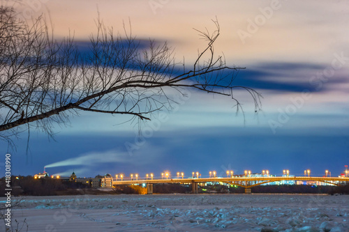 sunset over the river in winter in Omsk