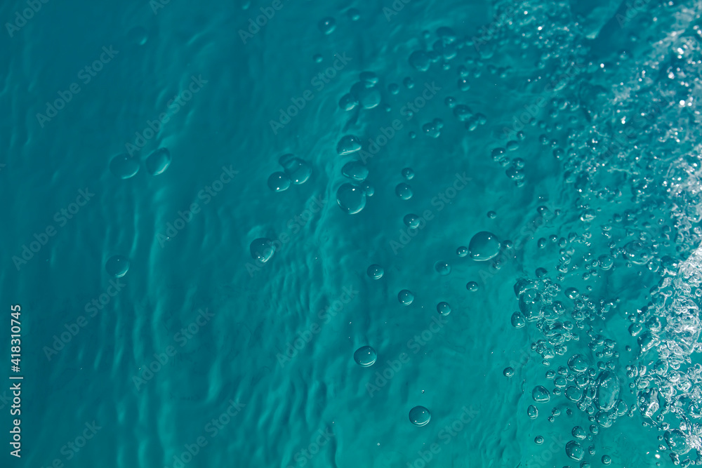 turquoise water background with bubbles