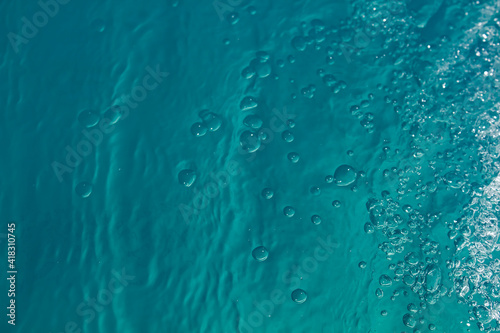 turquoise water background with bubbles