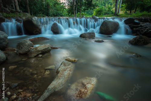 Waterfall hidden in the tropical jungle