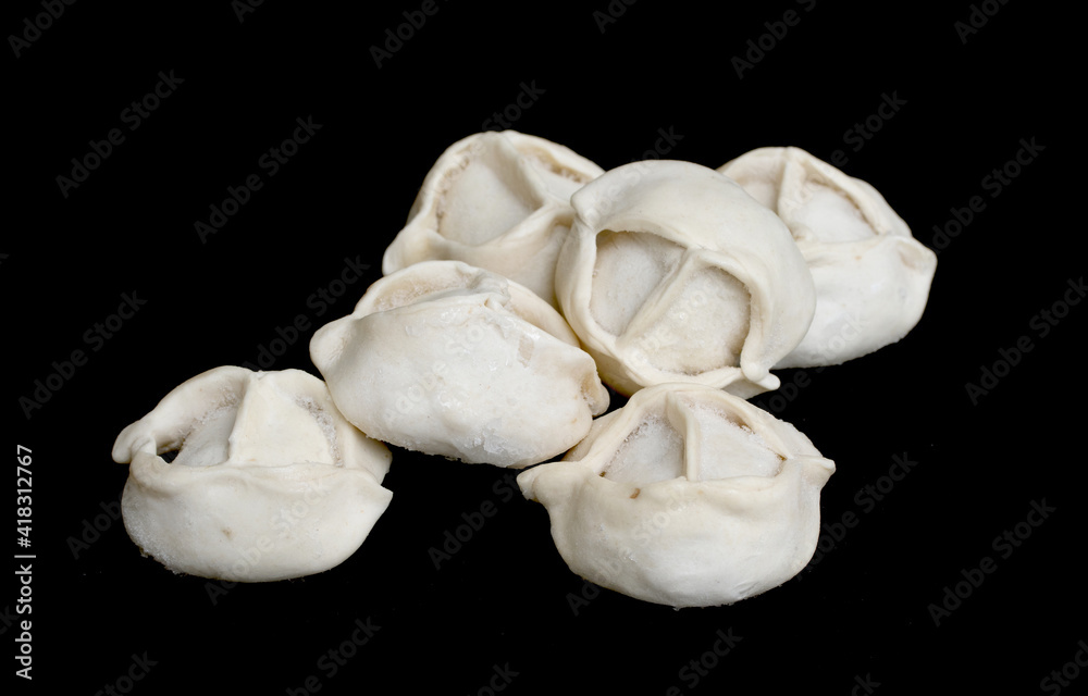 dumplings frozen on black background dumplings frozen on black background